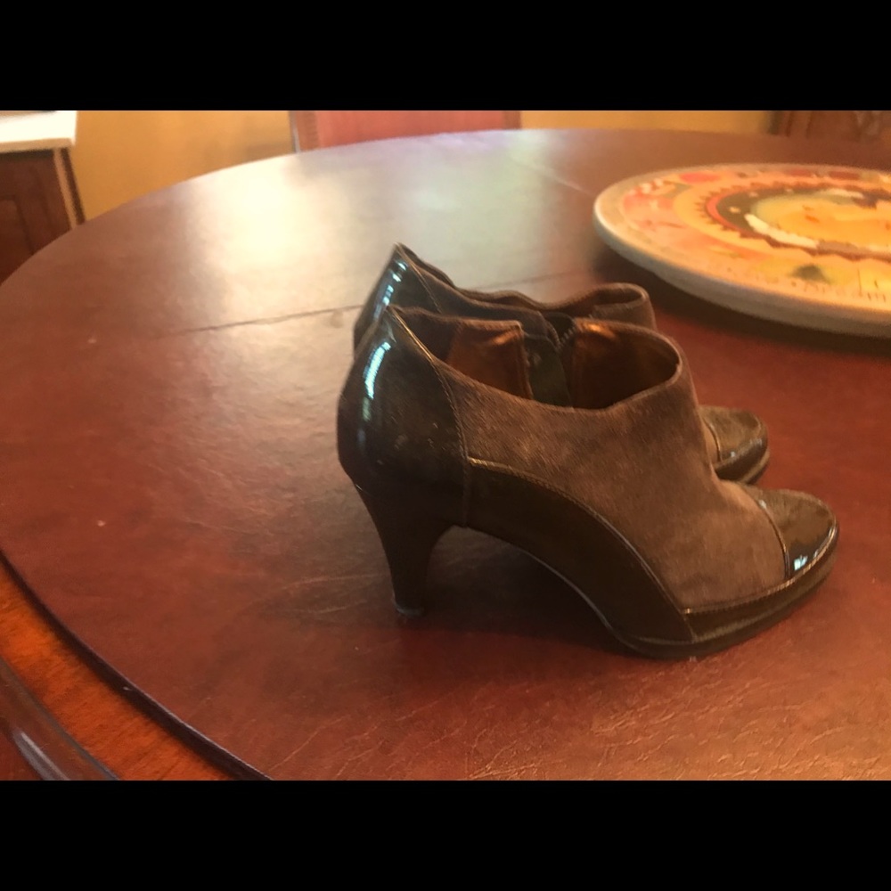 Gray suede and black patent leather booties.